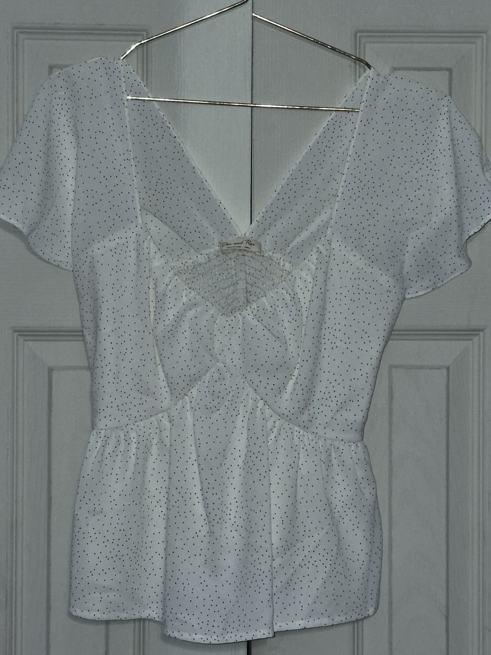 Doe & Rae White Polka Dot V-Neck Peplum Top